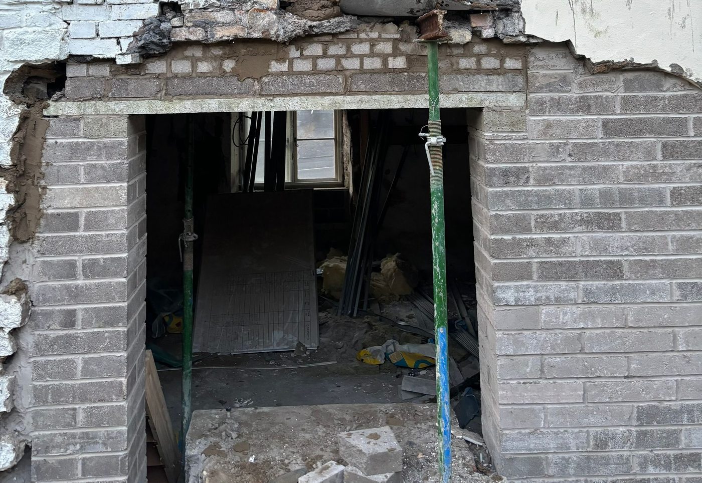 Structural opening with new brick lintel and pier